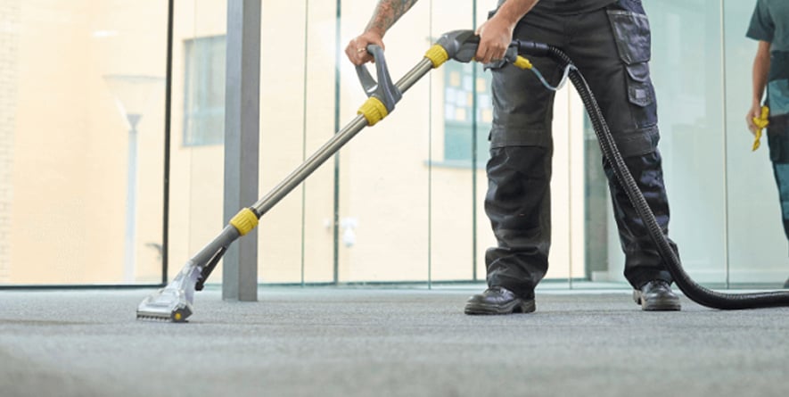 Professional carpet cleaning in progress, focusing on effective allergen removal for improved indoor air quality.