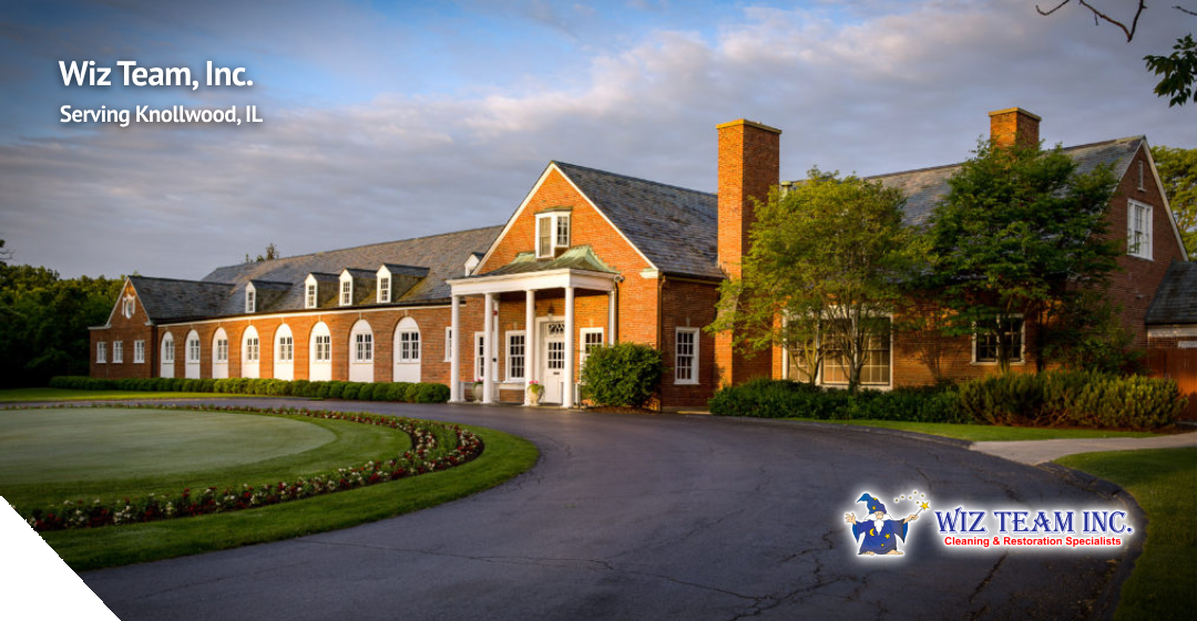 Wiz Team, Inc. building in Knollwood, IL, featuring a brick exterior, landscaped grounds, and logo, representing local cleaning and restoration services.