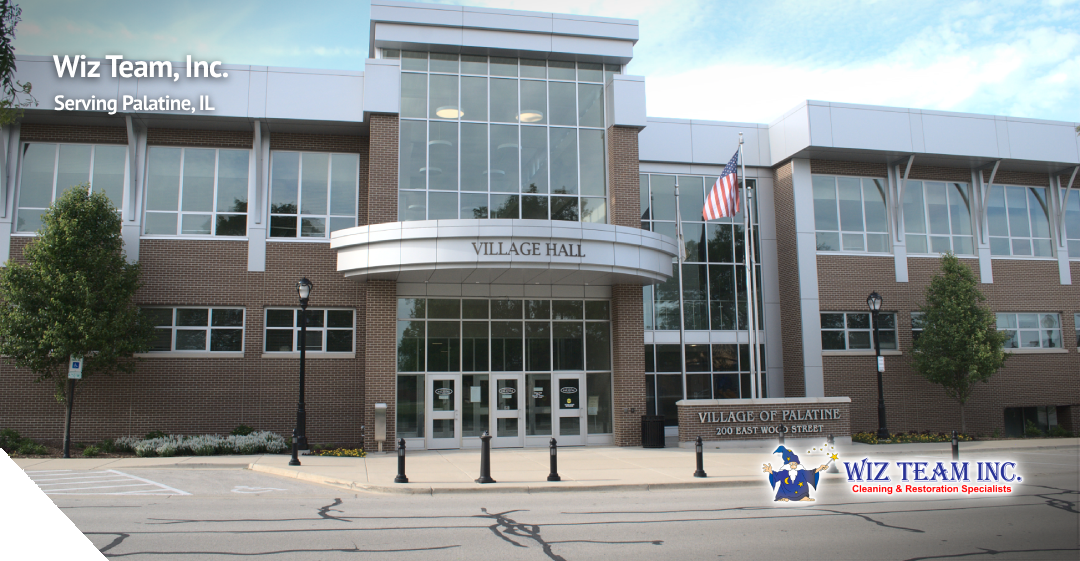 Wiz Team, Inc. logo and text overlay on a modern Village Hall building in Palatine, IL, featuring large glass windows, American flag, and landscaped surroundings, representing trusted local cleaning services.