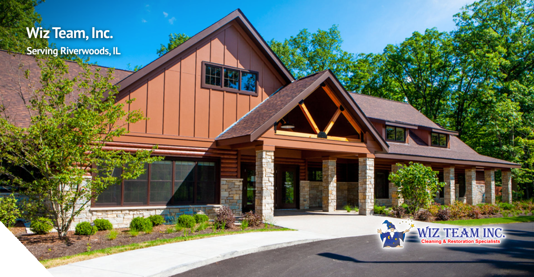 Wiz Team, Inc. building in Riverwoods, IL, showcasing eco-friendly design, surrounded by lush greenery, emphasizing community-focused cleaning services.
