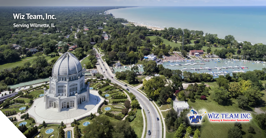 Aerial view of the Bahá’í House of Worship in Wilmette, IL, surrounded by lush greenery and Lake Michigan, with the logo of Wiz Team, Inc. in the corner, emphasizing their cleaning services for the local community.