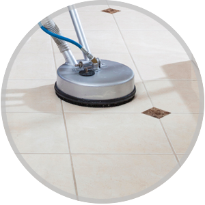 Tile and grout cleaning process with a specialized machine, showcasing effective cleaning for a healthy home environment.