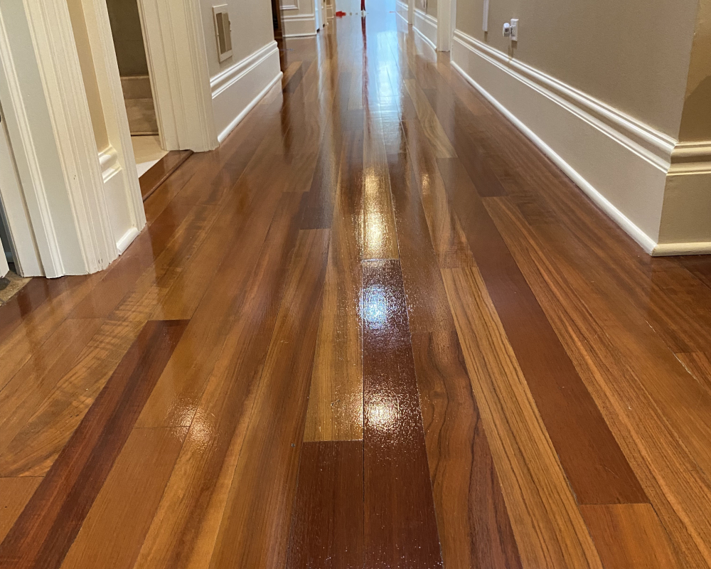 Professional hardwood floor cleaning by Wiz Team, Inc. showcasing eco-friendly techniques in Lake Forest, IL.