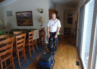 Hardwood floor cleaning by Wiz Team, Inc. in Lake Forest, featuring eco-friendly products and expert techniques.
